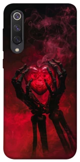 Чохол на Xiaomi Mi 9 SE Heart in the hands of a skeleton фото 1 з 1