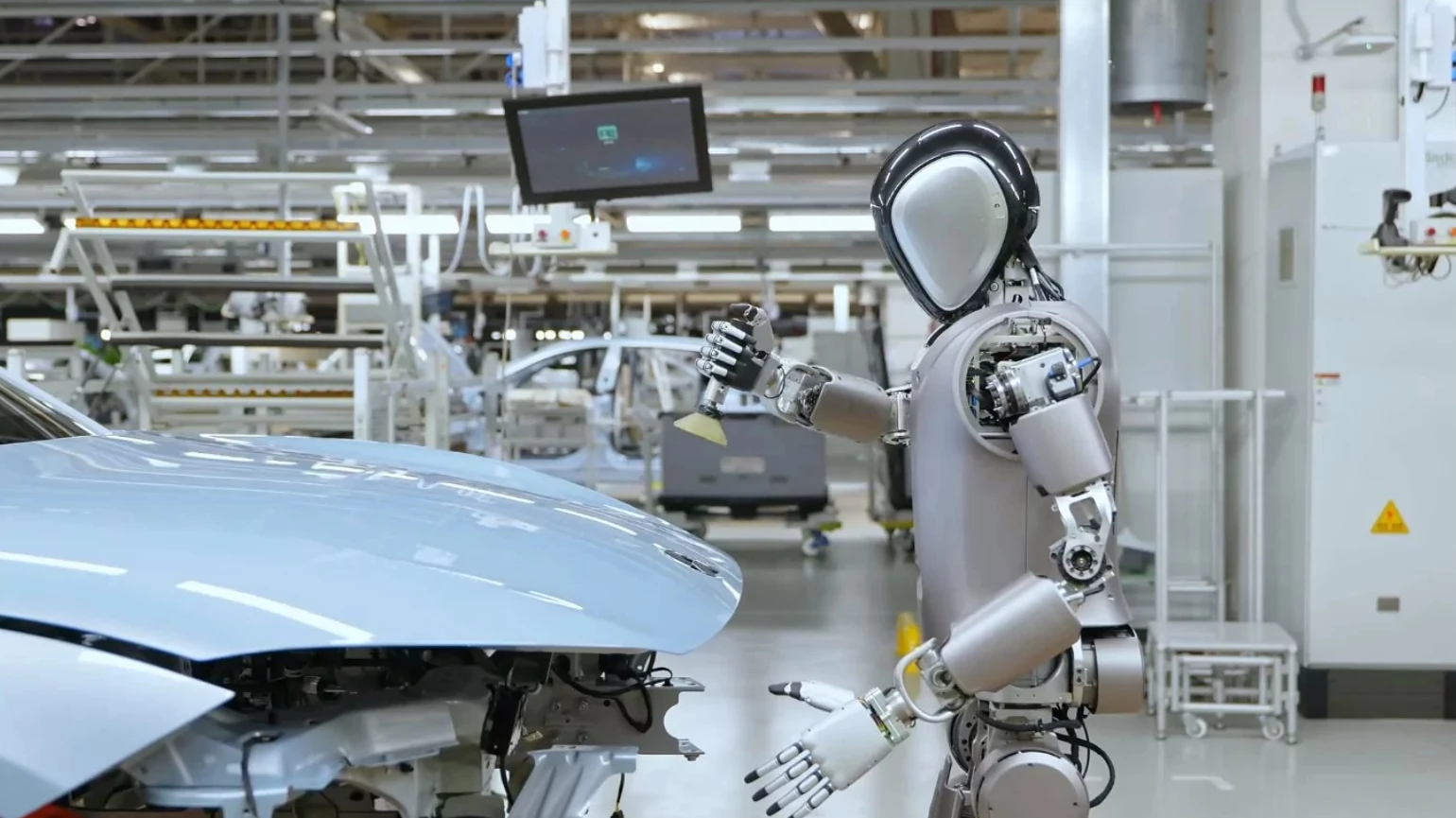 Запущено проект NIO складання автомобілів роботами-гуманоїдами фото 2